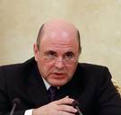 De nieuwe Russische premier houdt van computers, ijshockey en geld