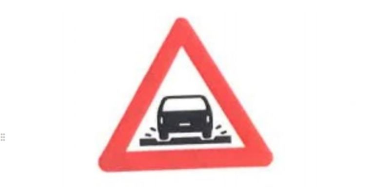 Dit verkeersbord moet mensen waarschuwen voor tramsporen.