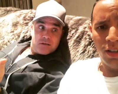 Lachen! Robbie Williams praat perfect plat Amsterdams