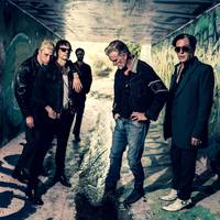 Queens of the Stone Age is terug met ‘Perfecth’: ‘Met perfectie sta je nergens. Elk moment kan alles om zeep gaan’
