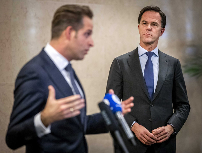 Minister Hugo de Jonge (L) en premier Mark Rutte