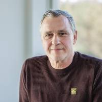 Chris Tates geeft een sneer naar zijn collega