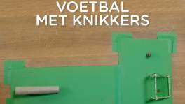 Voetbal met knikkers