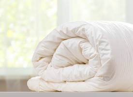 Zó neemt je winterdekbed minder ruimte in in de kast